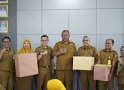 Plt Bupati Lampung Tengah Hadiri Rakor Dinkes, Serahkan Penghargaan dan Puskesmas Keliling