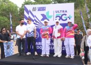 Ketua PERWOSI Lampung Tengah Ni Ketut Dewi Nadi Lepas Peserta Jalan Sehat XL Weekend Rush di Bandar Jaya
